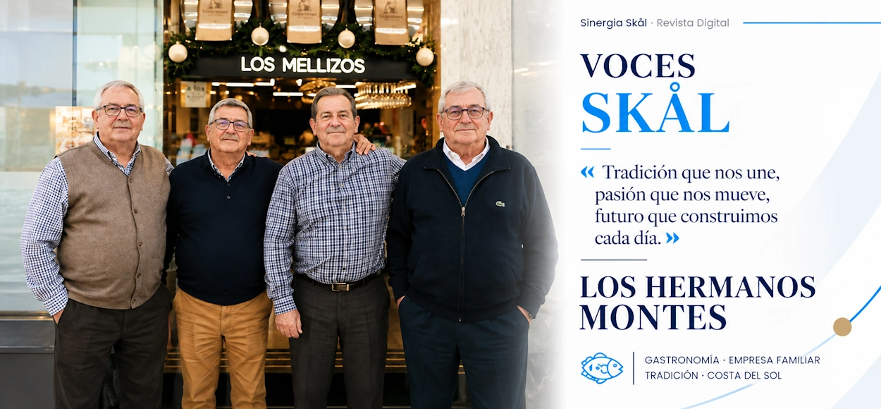 Cuatro hombres en un restaurante con decoración marinera y productos del mar.